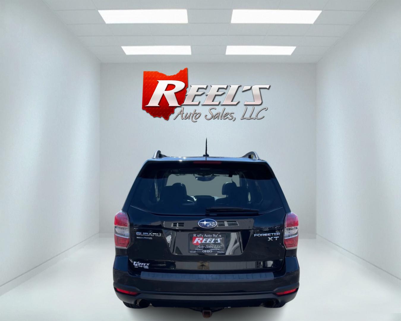 2014 Black /Black Subaru Forester 2.0XT Touring (JF2SJGMC4EH) with an 2.0L H4 SOHC 16V TURBO engine, Automatic transmission, located at 547 E. Main St., Orwell, OH, 44076, (440) 437-5893, 41.535435, -80.847855 - Photo#6